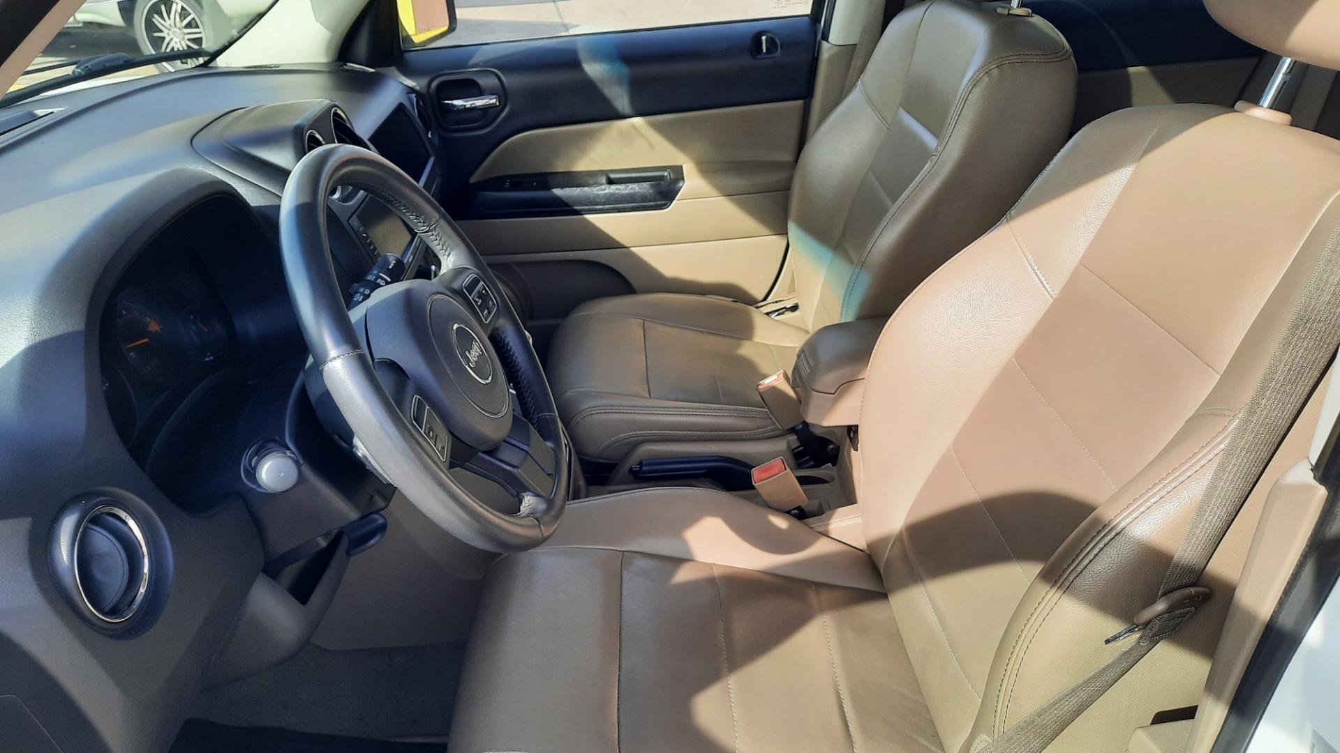 2015 Jeep Patriot (1C4NJPFA8FD) , located at 16710 Clay Rd., Houston, TX, 77084, (281) 859-7900, 29.834864, -95.656166 - Photo#2